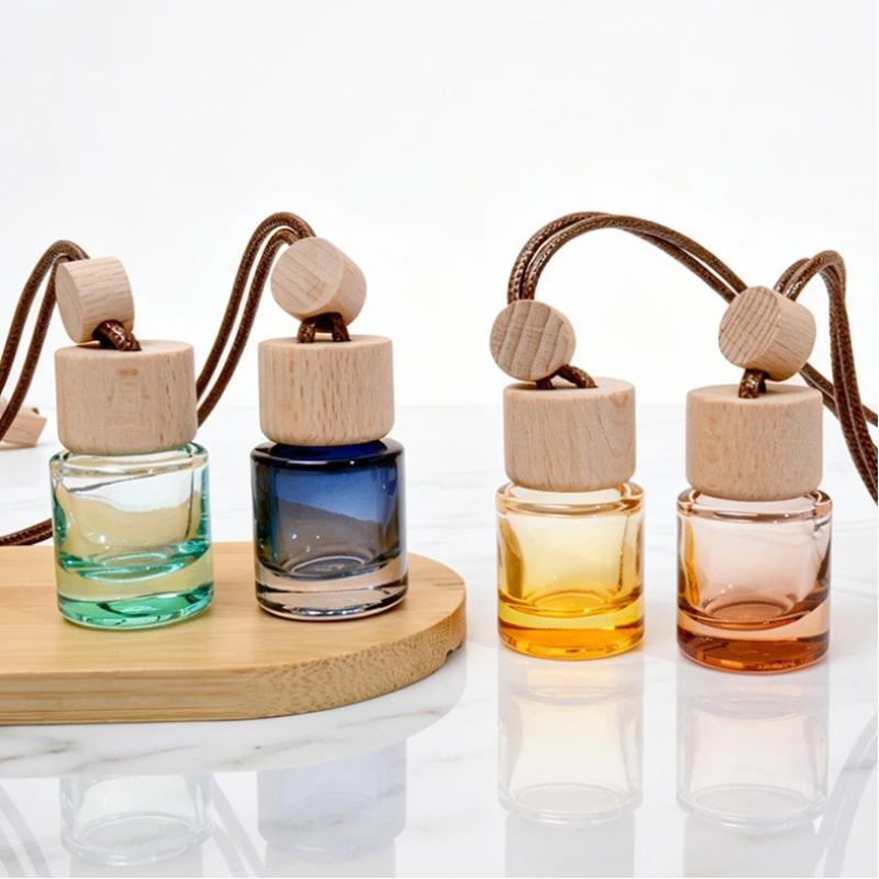 Car Fragrance Diffuser - ขวดน้ำมันหอมระเหยแบบจี้กลมขนาดเล็ก สำหรับปรับอากาศในรถยนต์ น้ำหอมตกแต่ง