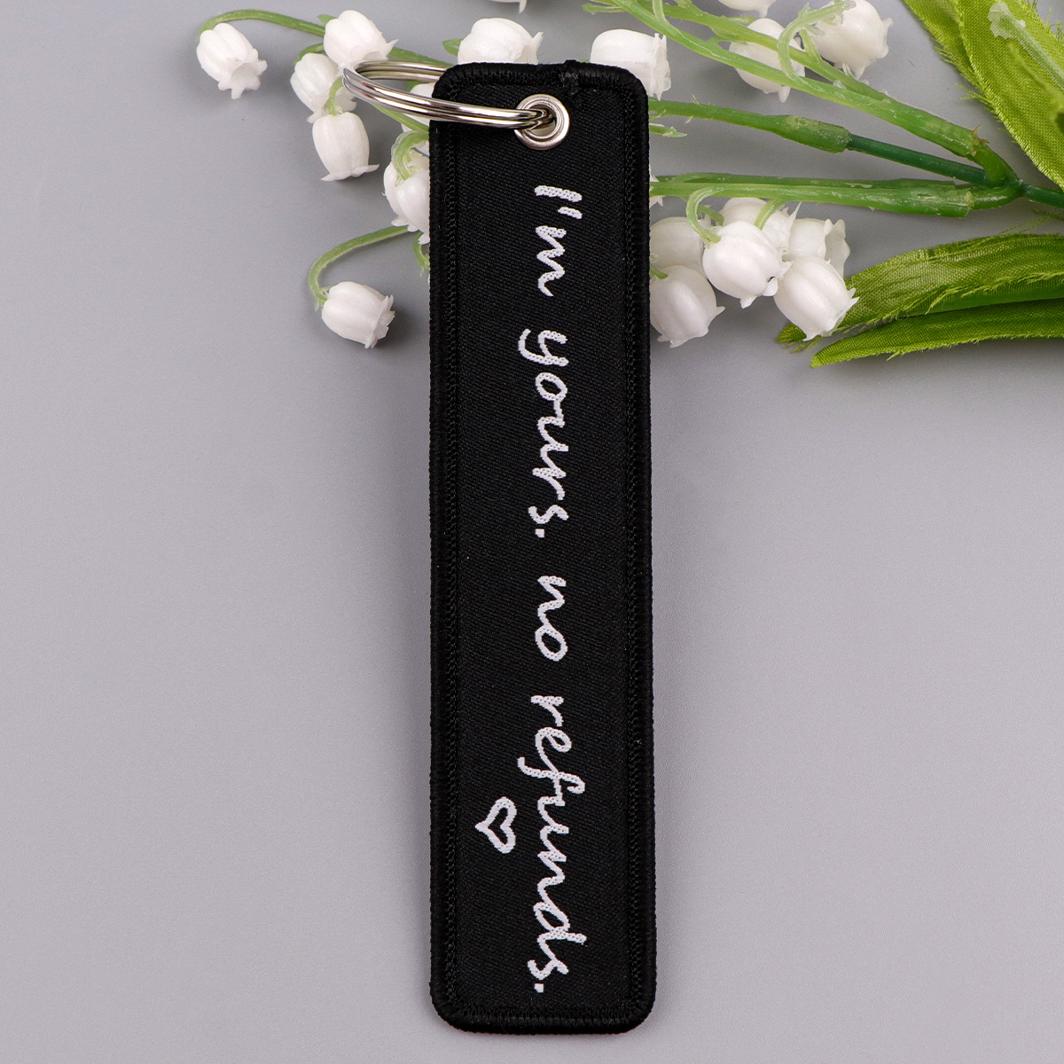 พวงกุญแจปักลายสีดำ ลายคำคมจาก  - Car Accessories Quotation บทวิจารณ์และราคา